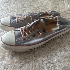 Gray Low-Top Sneakers with White and Red Accents